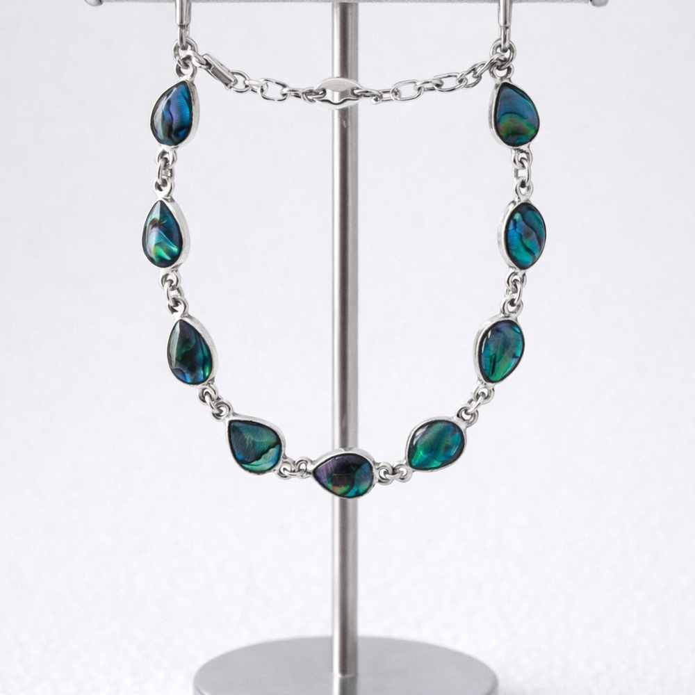 Silver link bracelet with teardrop-shaped abalone. - Picture 2 of 3